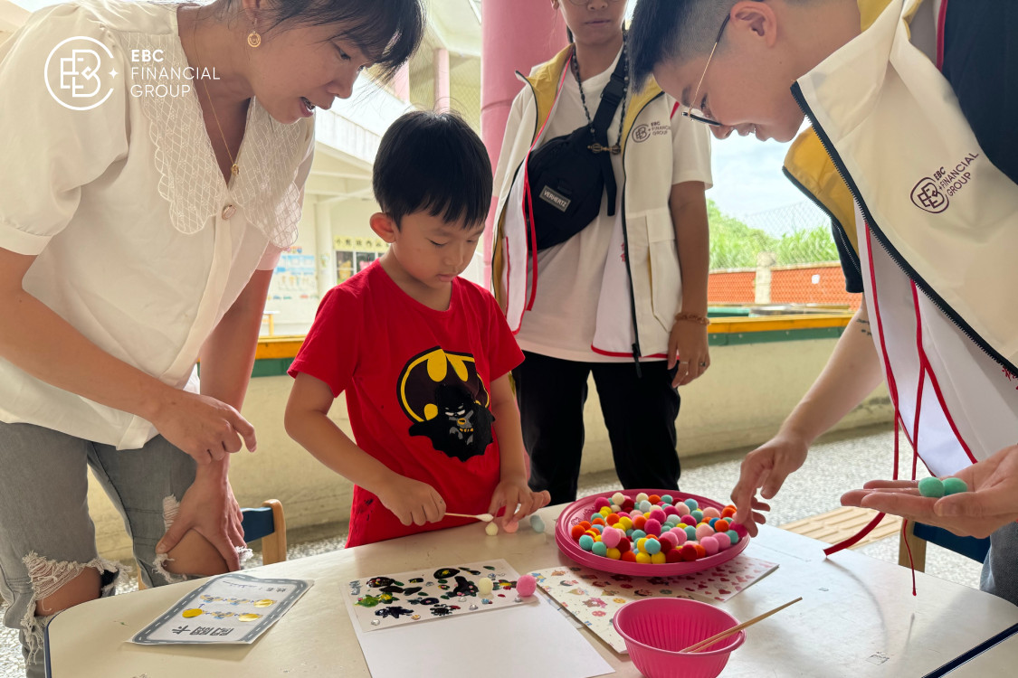 EBC staff playing games with children