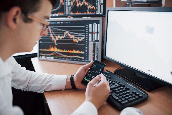 A Professional Trader is Monitoring His Trades