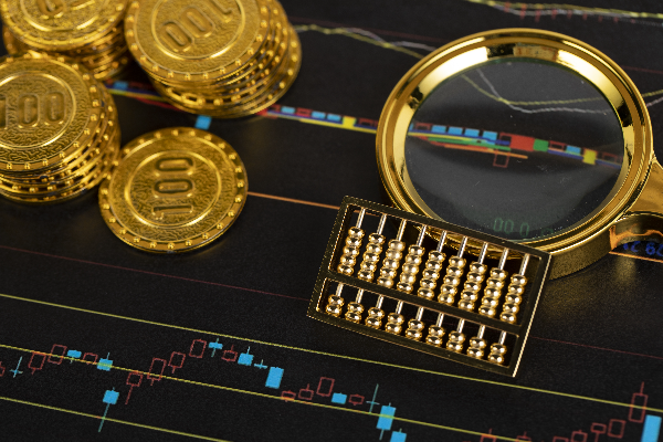 Magnifier Abacus and Gold Coins on Digital Stock